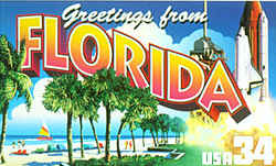 Florida Greeting: At the left is a beach and palm trees in St. Petersburg, with a colorful sail visible on the water in the distance. At the right, the space shuttle Discovery lifts off its launching pad at Cape Canaveral. 